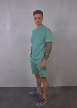 XPLCT artist shorts green