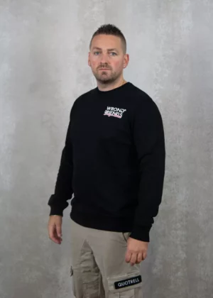 Wrong Friends taos sweater black