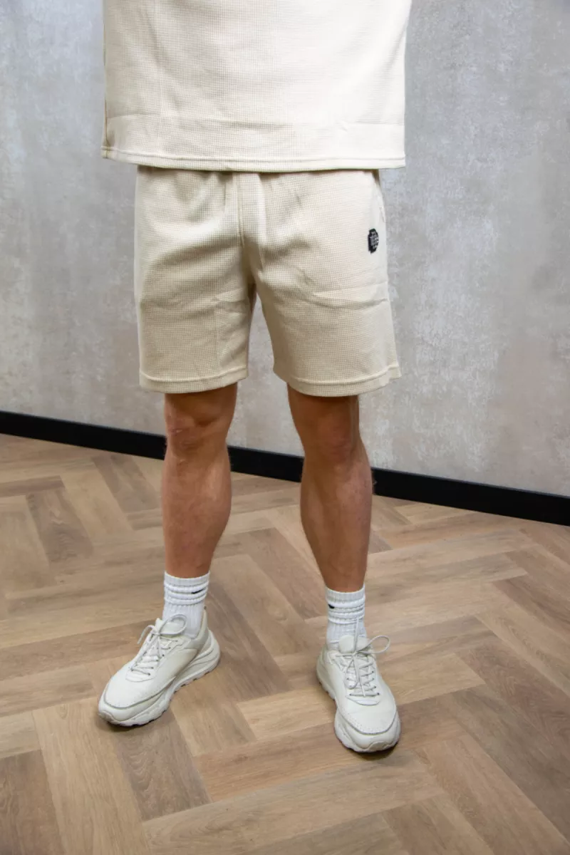 Black Bananas monogram waffle shorts beige